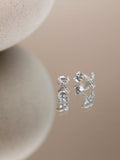 IBB cross cubic zirconia earrings in 18ct white gold - British product