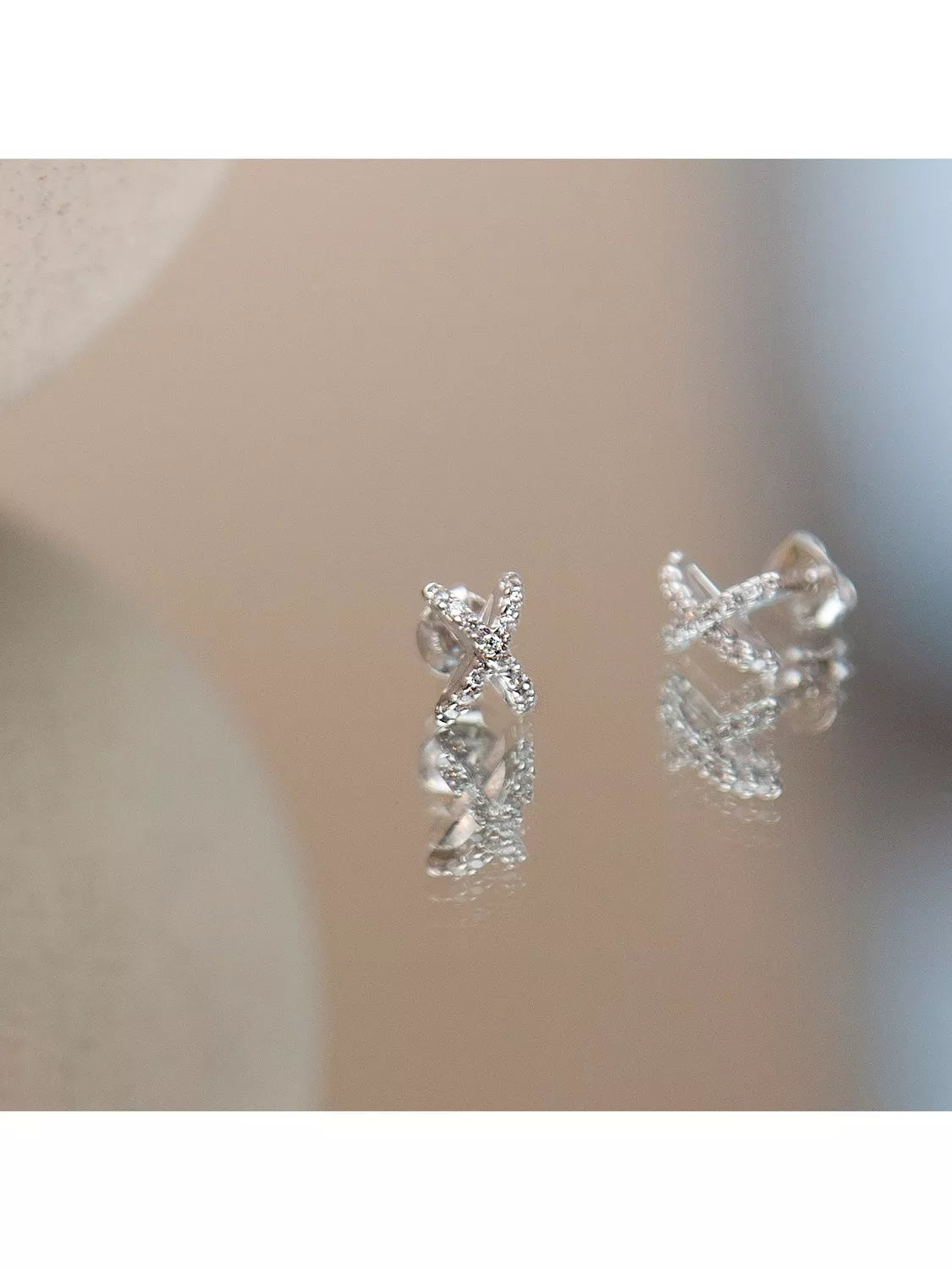 IBB cross cubic zirconia earrings in 18ct white gold - British product