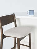 John Lewis Parity bar stool in solid oak with fabric seat, imported from the UK