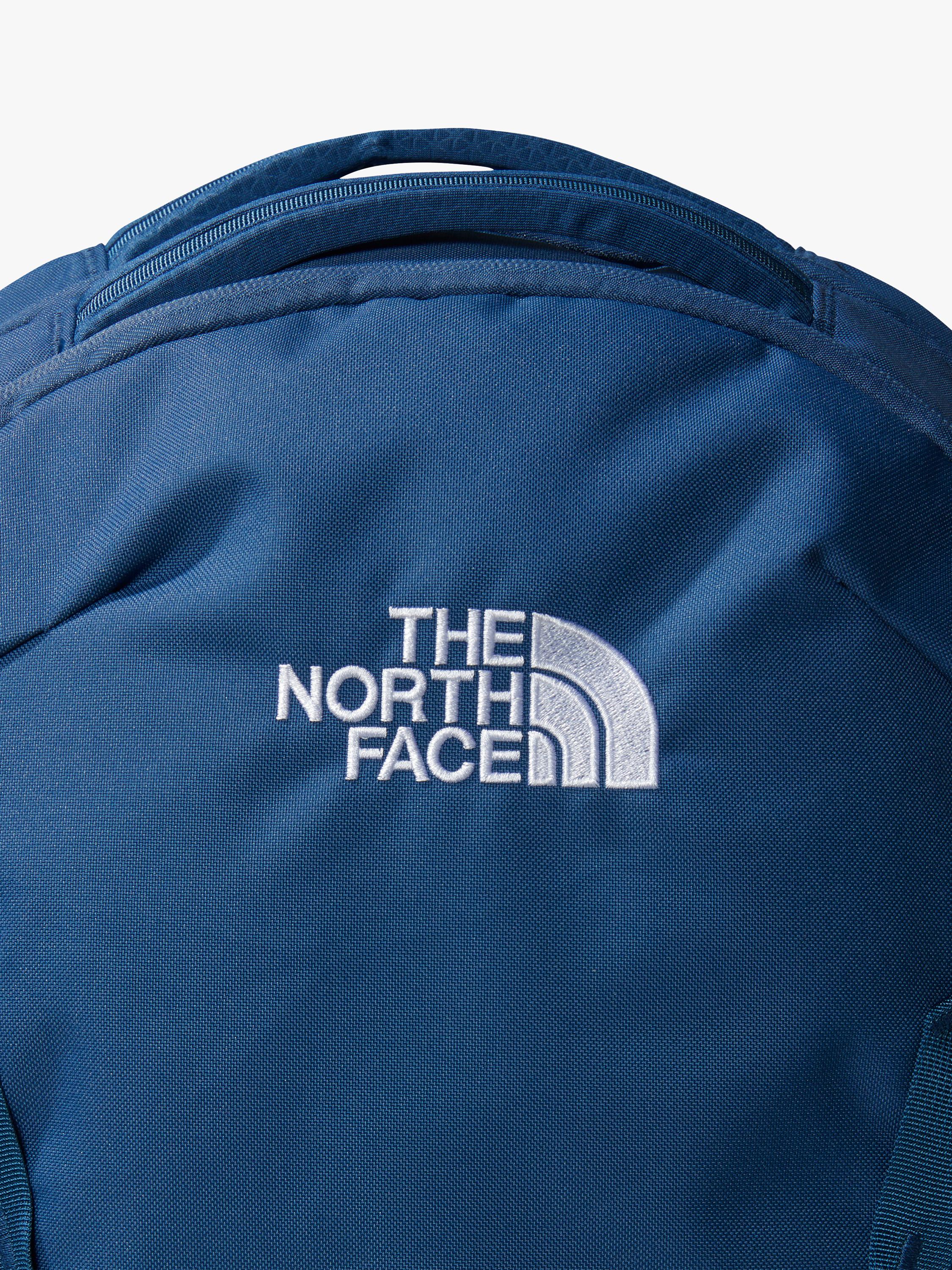 The North Face Vault backpack in blue and white, imported from the UK