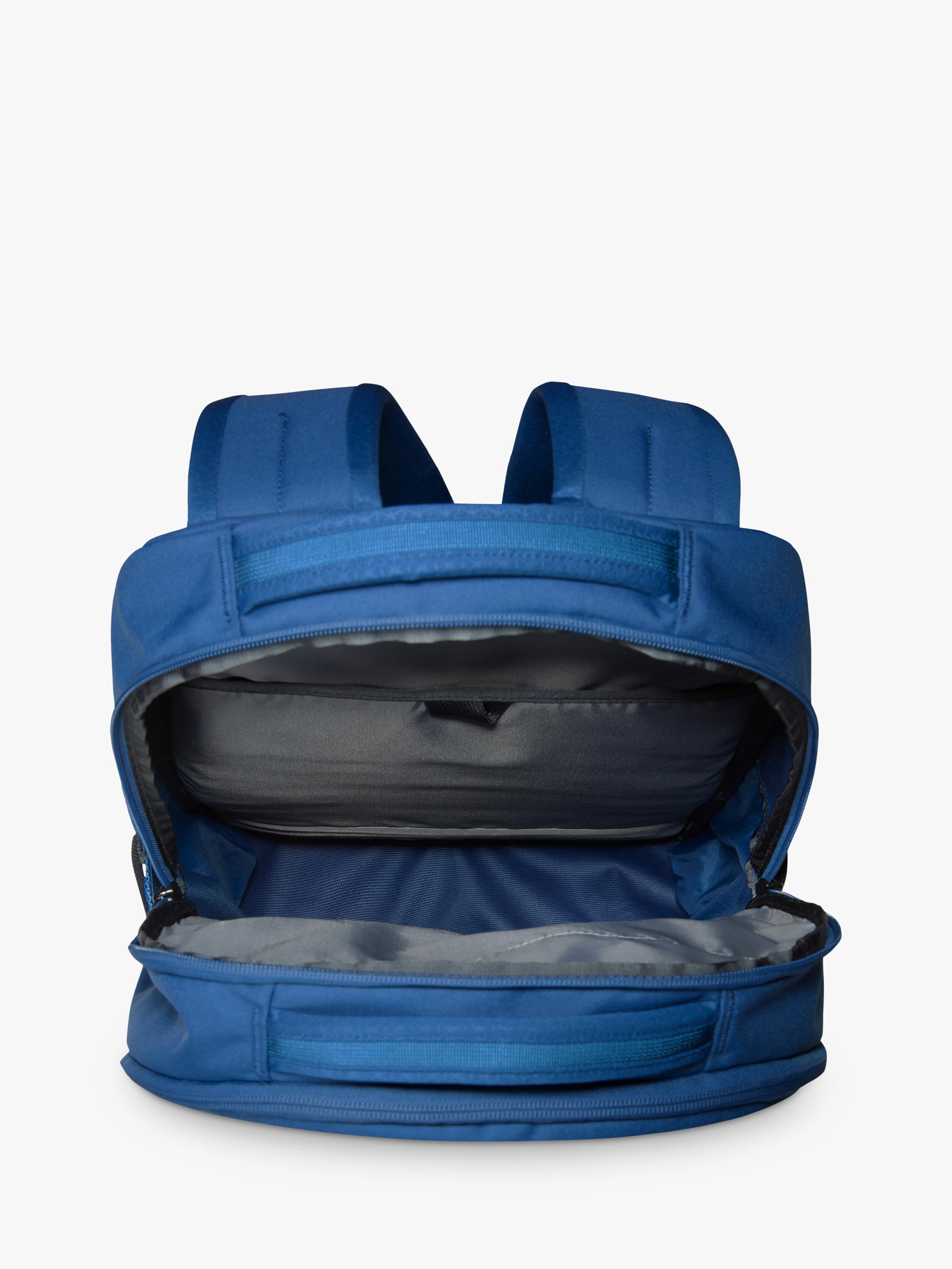 The North Face Vault backpack in blue and white, imported from the UK