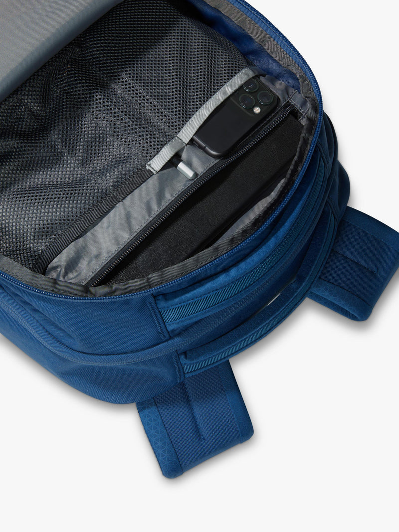 The North Face Vault backpack in blue and white, imported from the UK