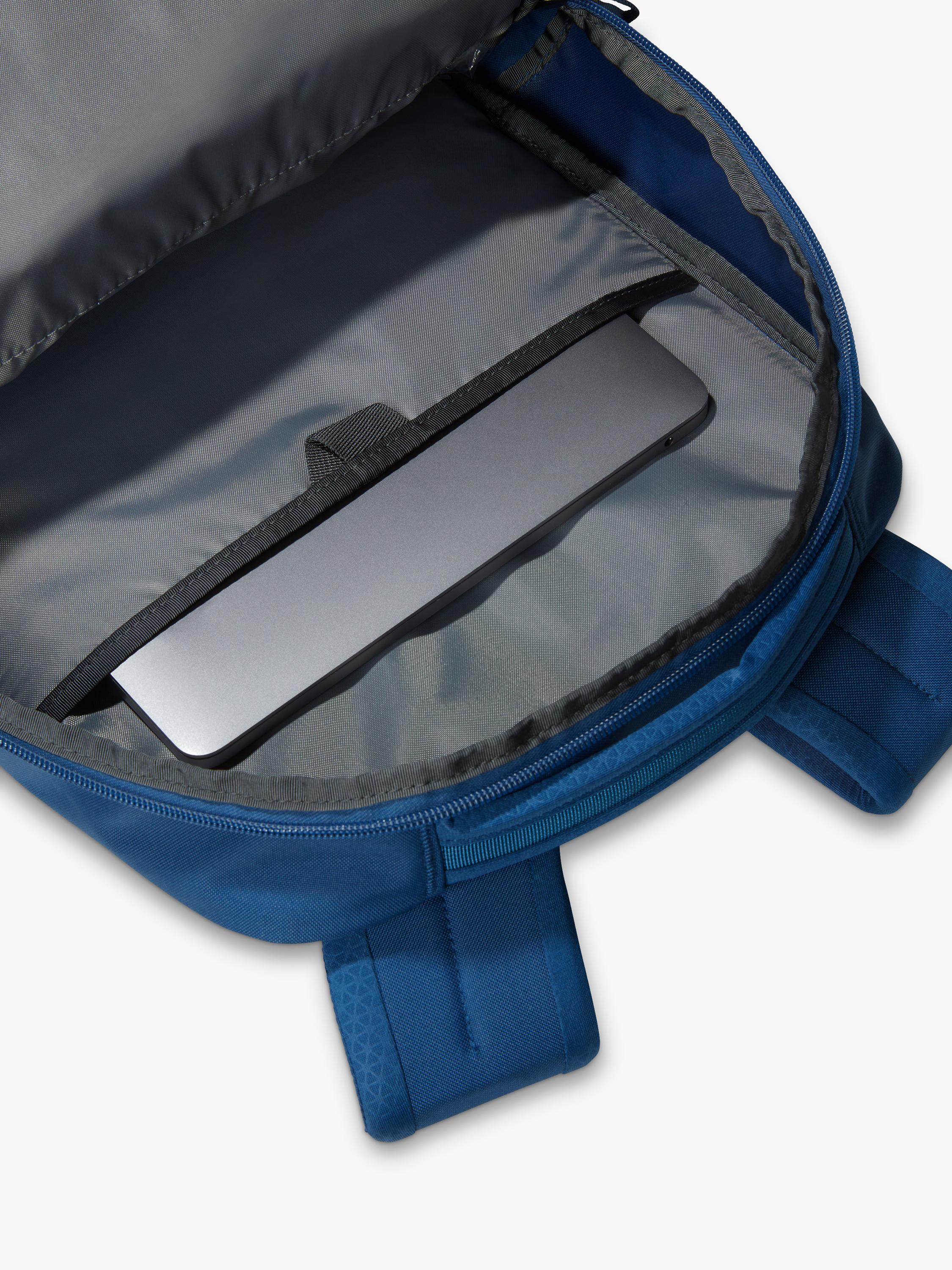 The North Face Vault backpack in blue and white, imported from the UK