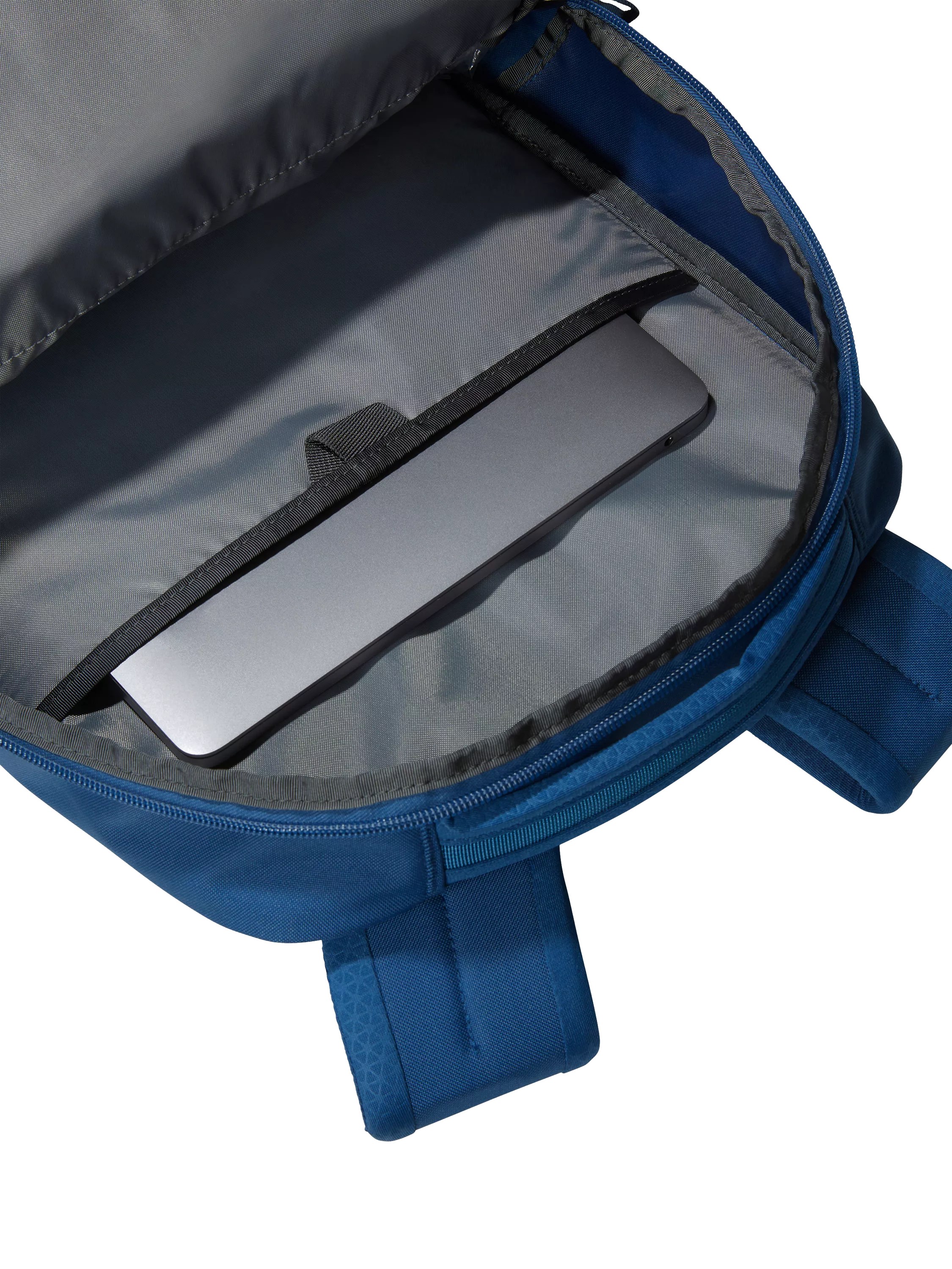The North Face Vault backpack in blue and white, imported from the UK