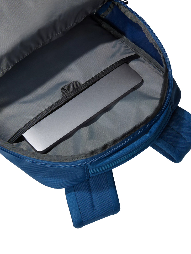 The North Face Vault backpack in blue and white, imported from the UK