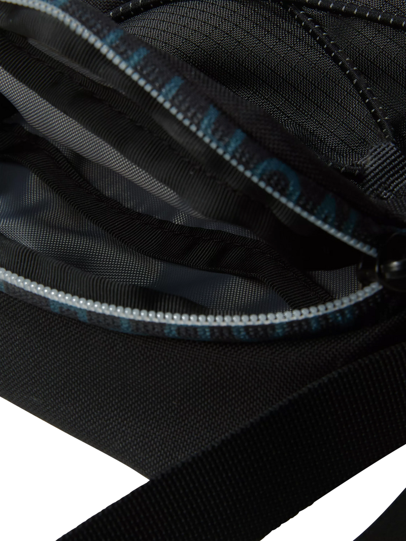 The North Face Jester cross body bag in asphalt grey and black, UK version