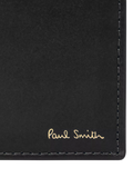 Paul Smith black bifold wallet with signature stripe interior, imported from the UK