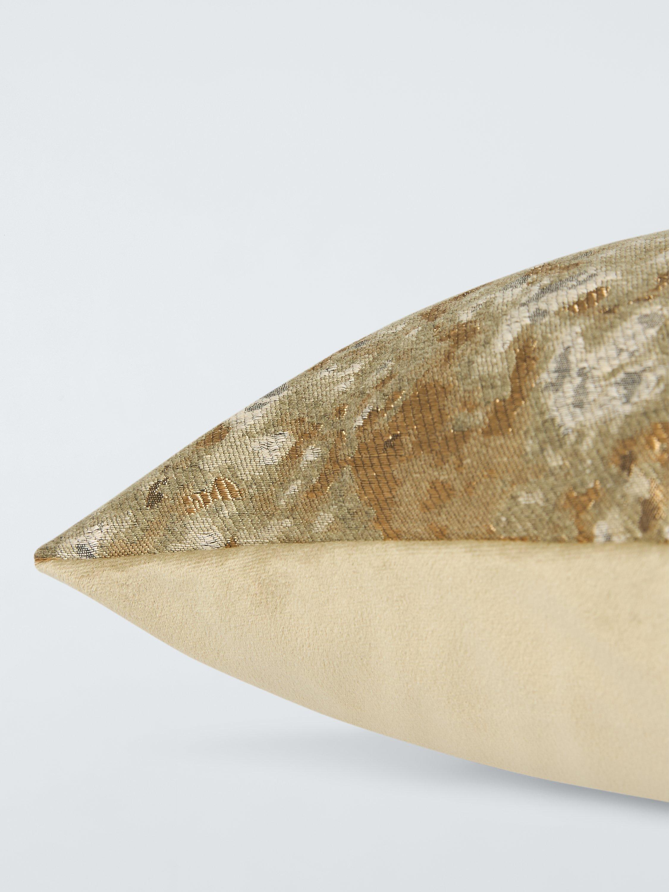 Harlequin Aconite cushion with dappled design and metallic highlights, UK version