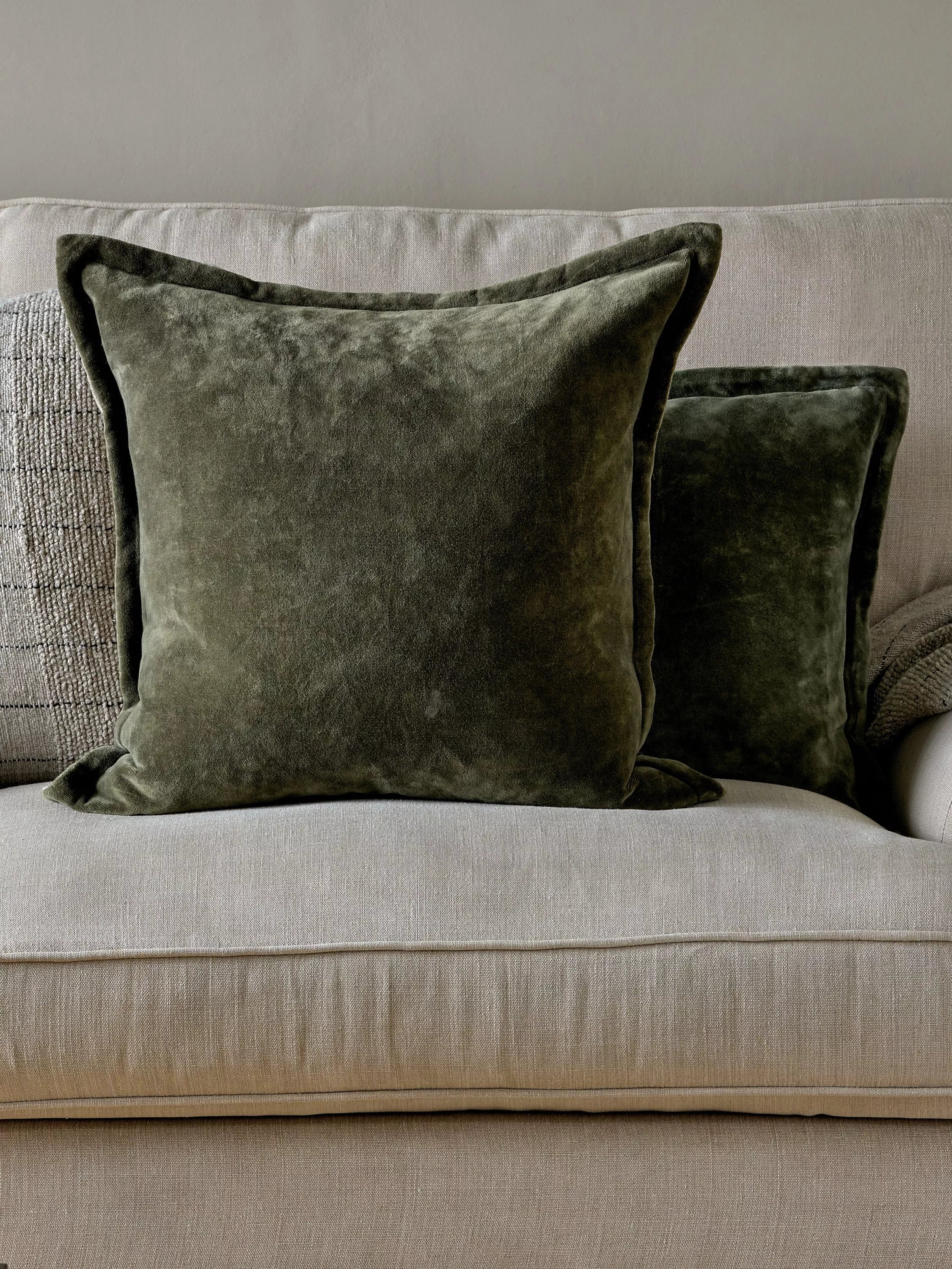 nkuku Pilani Square cushion cover in moss green (British brand)