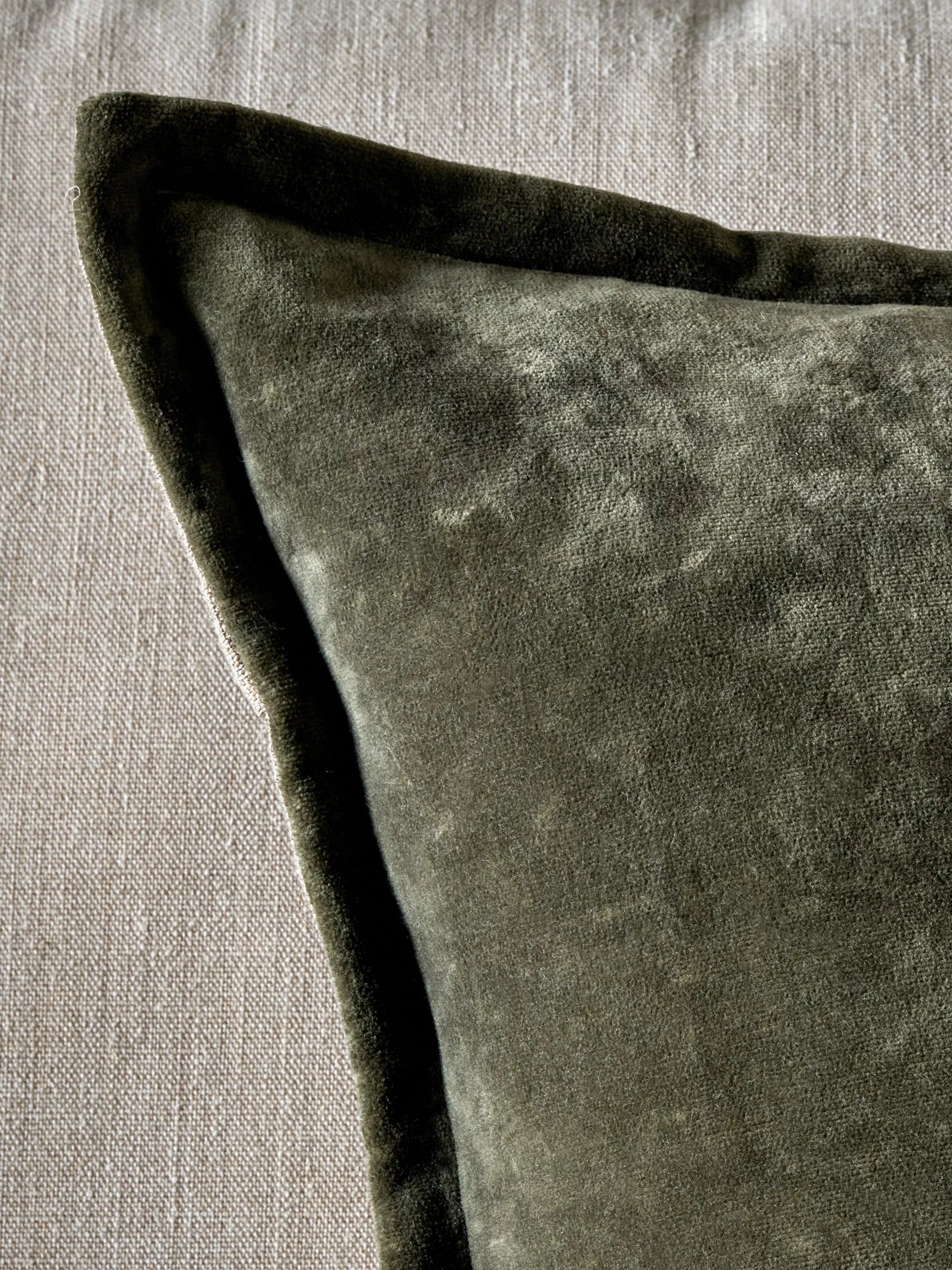nkuku Pilani Square cushion cover in moss green (British brand)