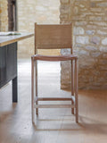 nkuku Nayan counter chair in tan buffalo leather, imported from the UK