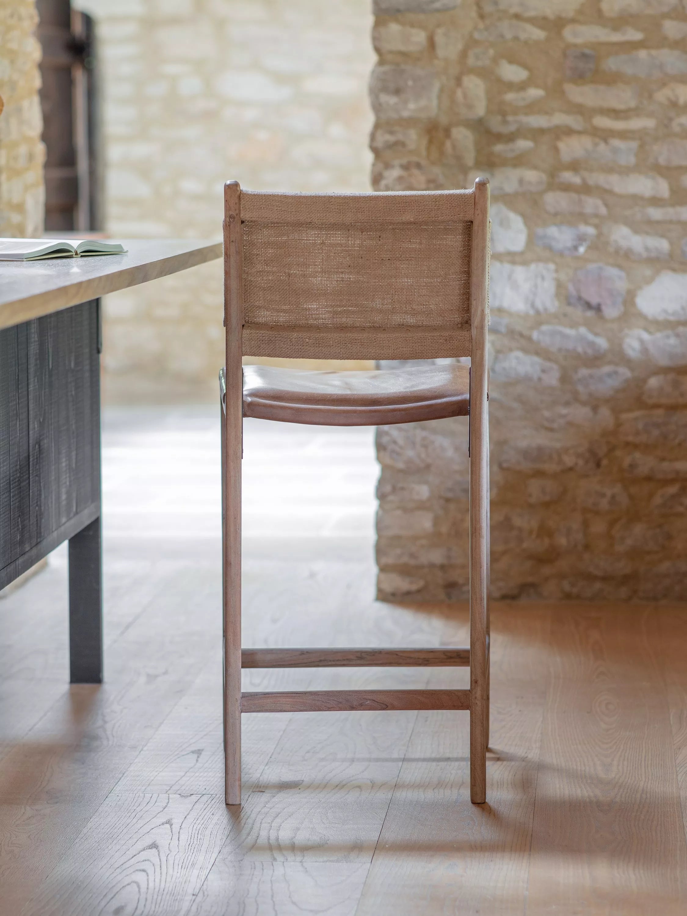 nkuku Nayan counter chair in tan buffalo leather, imported from the UK