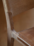 nkuku Nayan counter chair in tan buffalo leather, imported from the UK