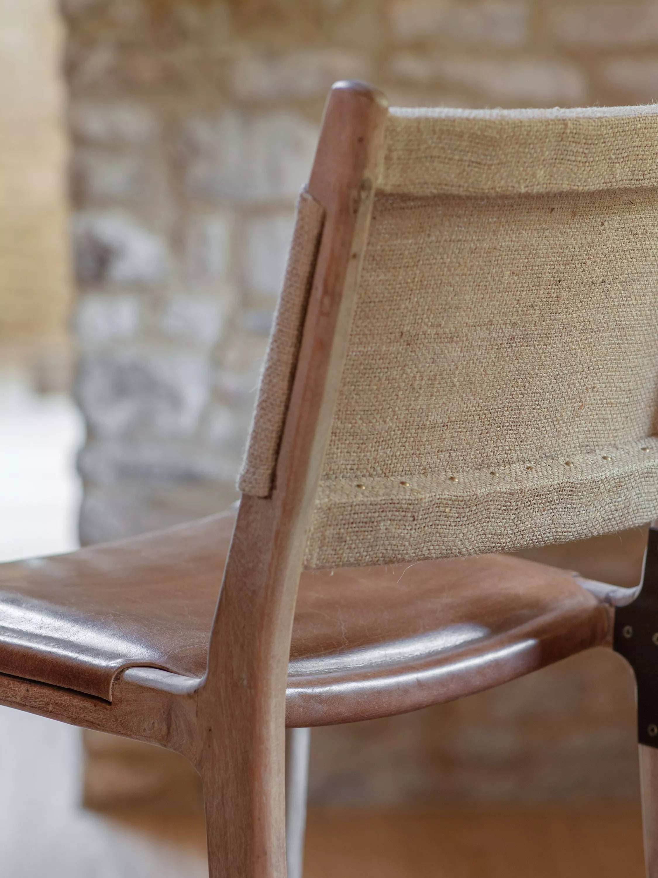 nkuku Nayan counter chair in tan buffalo leather, imported from the UK