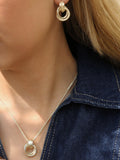 Tutti Fuse interlocking drop earrings in gold, imported from the UK