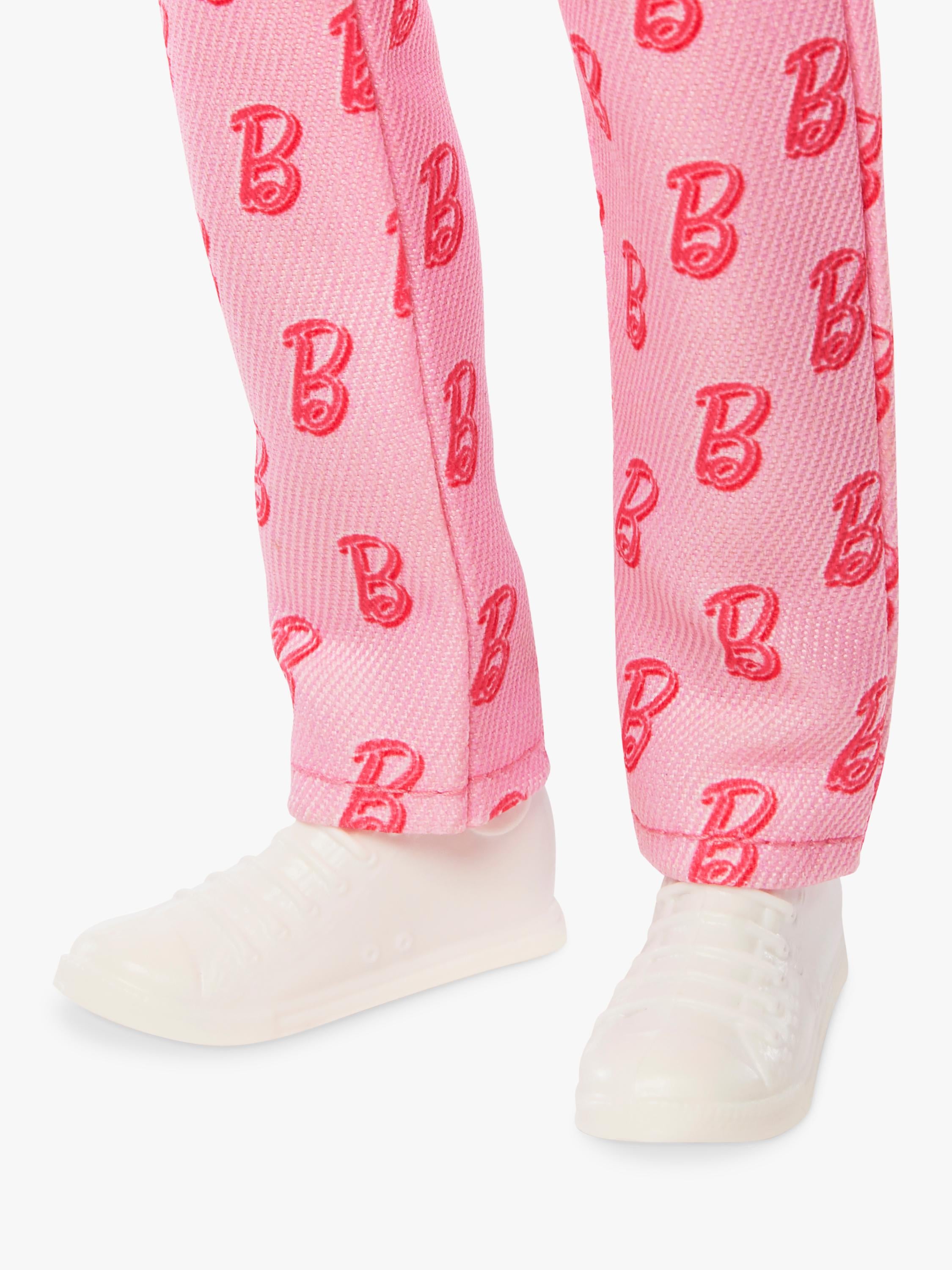 Barbie Ken doll pink jumpsuit roller skates, imported from the UK