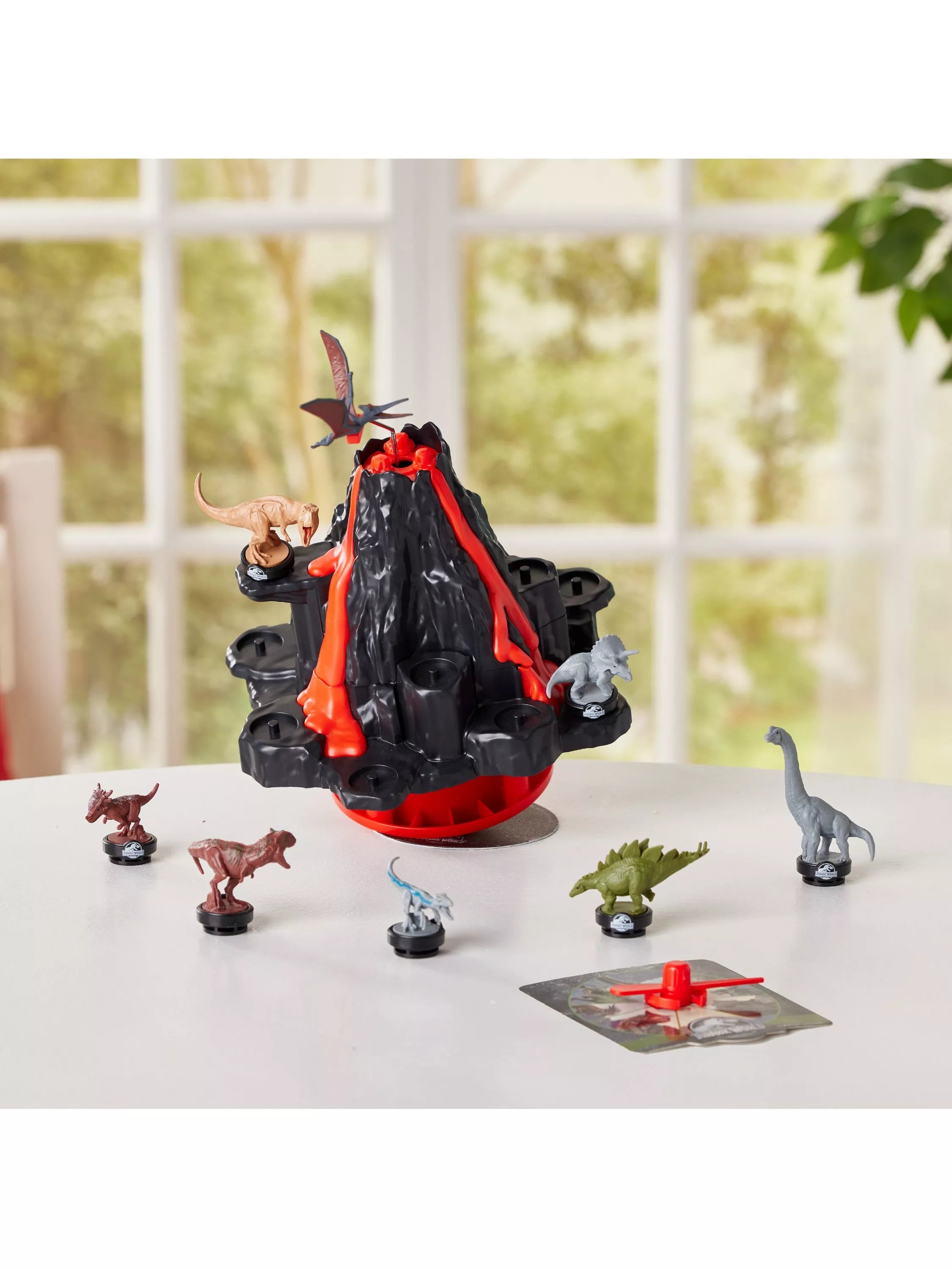 Jurassic World shaky volcano game with dinosaur figures, UK version