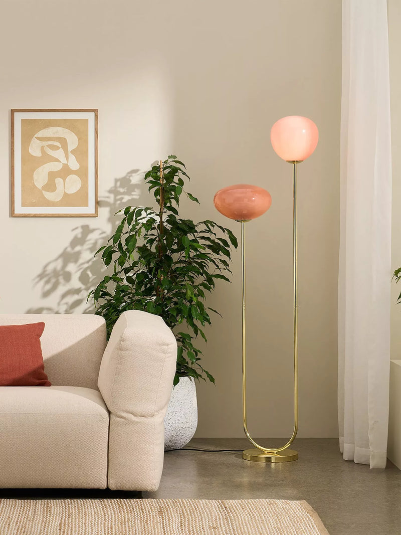 MADE floor lamp with pink glass shades and brass accents, imported from the UK