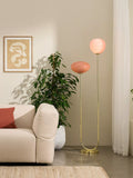 MADE floor lamp with pink glass shades and brass accents, imported from the UK