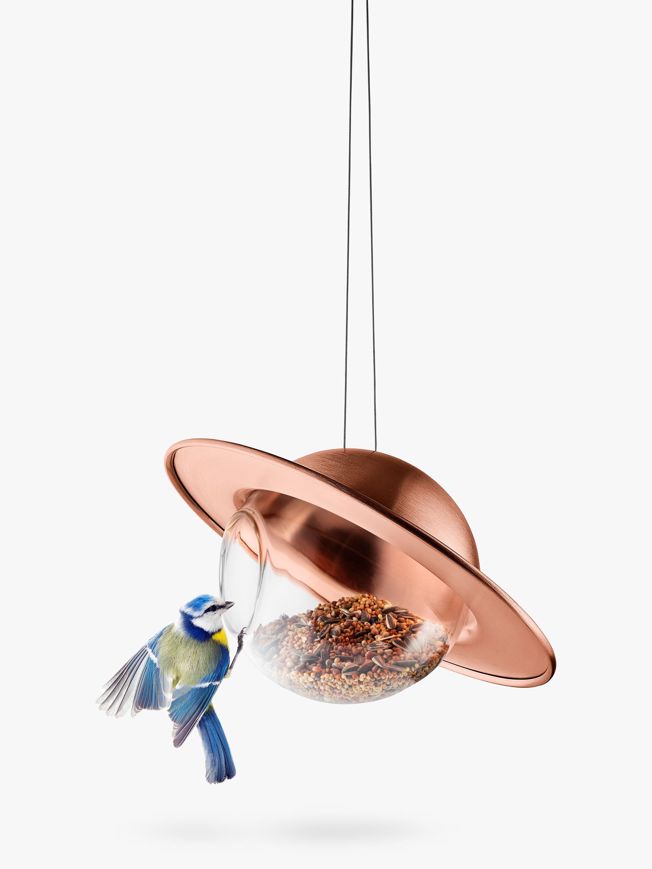 Eva Solo Saturn bird feeder with copper canopy and glass orb, imported from the UK