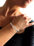 Nina B sterling silver tension bangle (British brand)