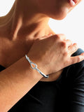 Nina B sterling silver tension bangle (British brand)