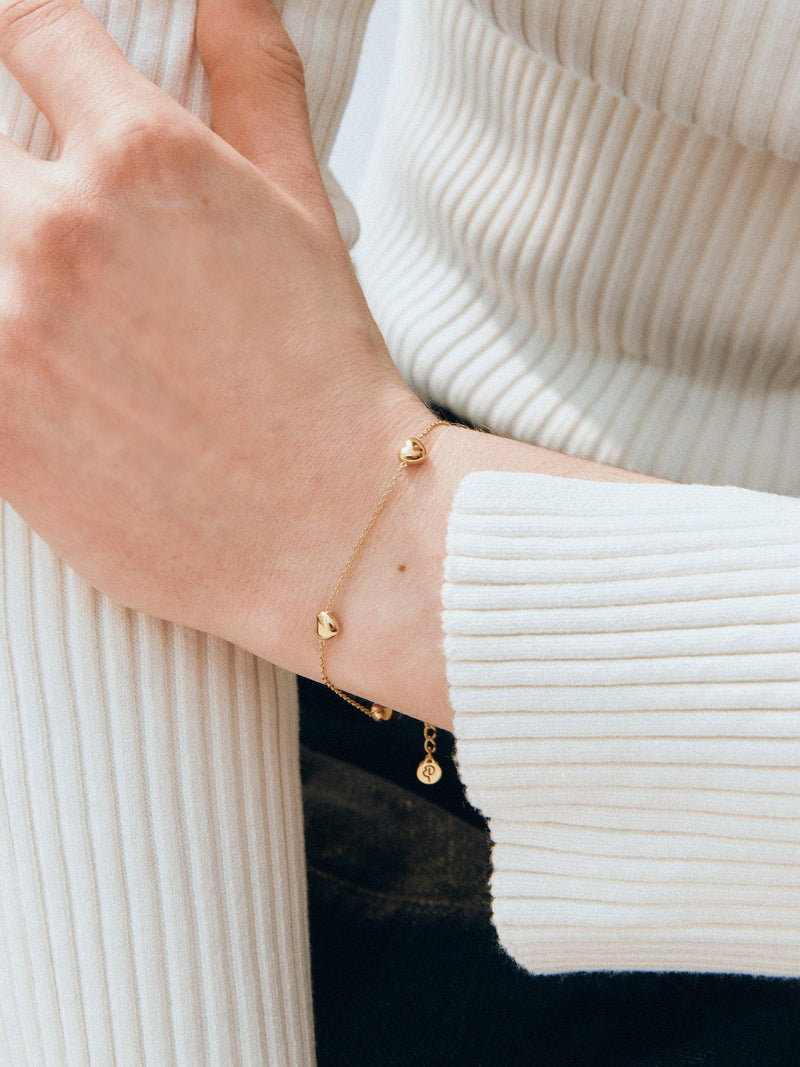 EDBLAD Barley Bracelet with four gold heart charms imported from the UK