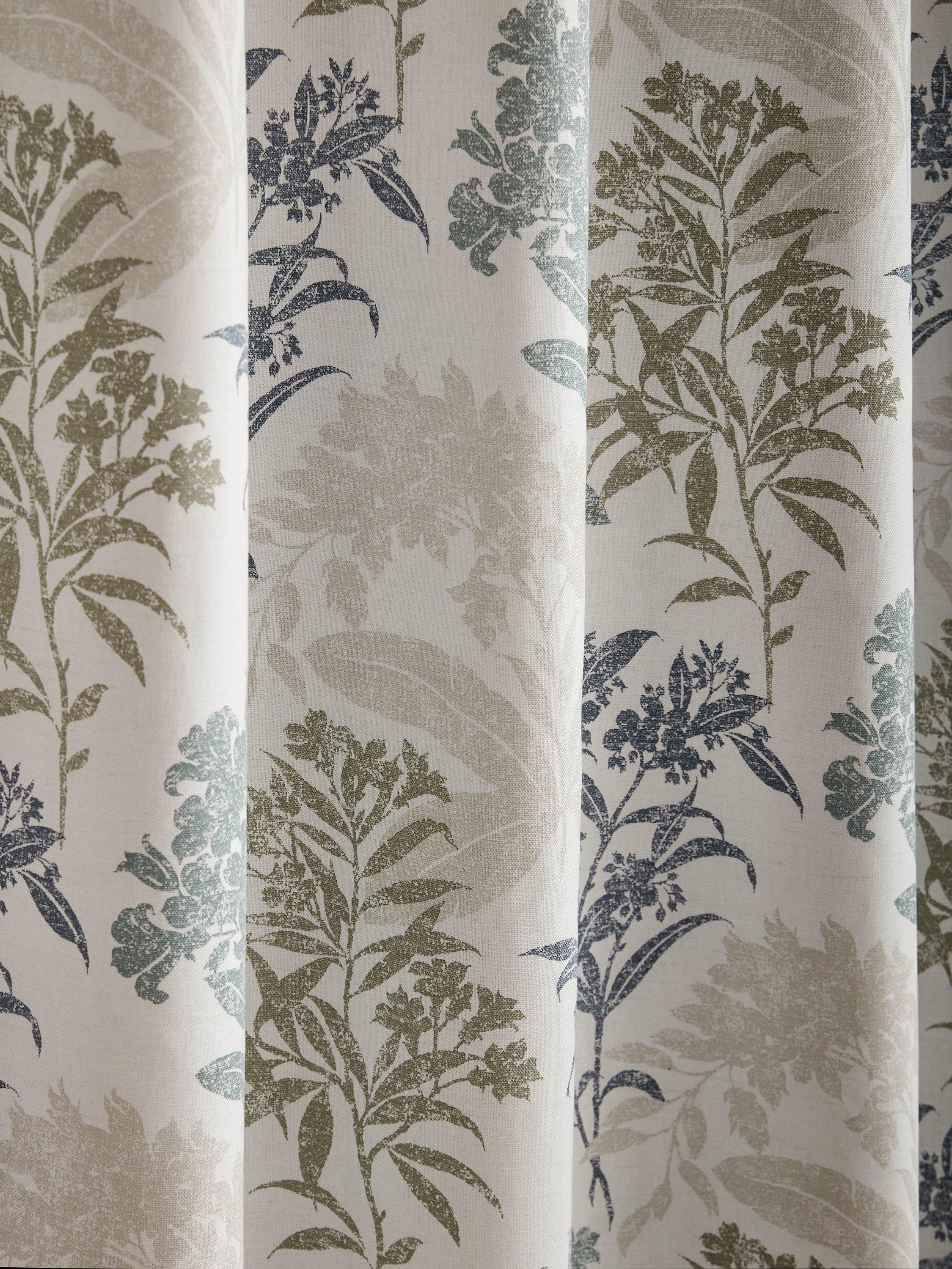 Laura Ashley lined eyelet curtains with floral design in seaspray, UK version