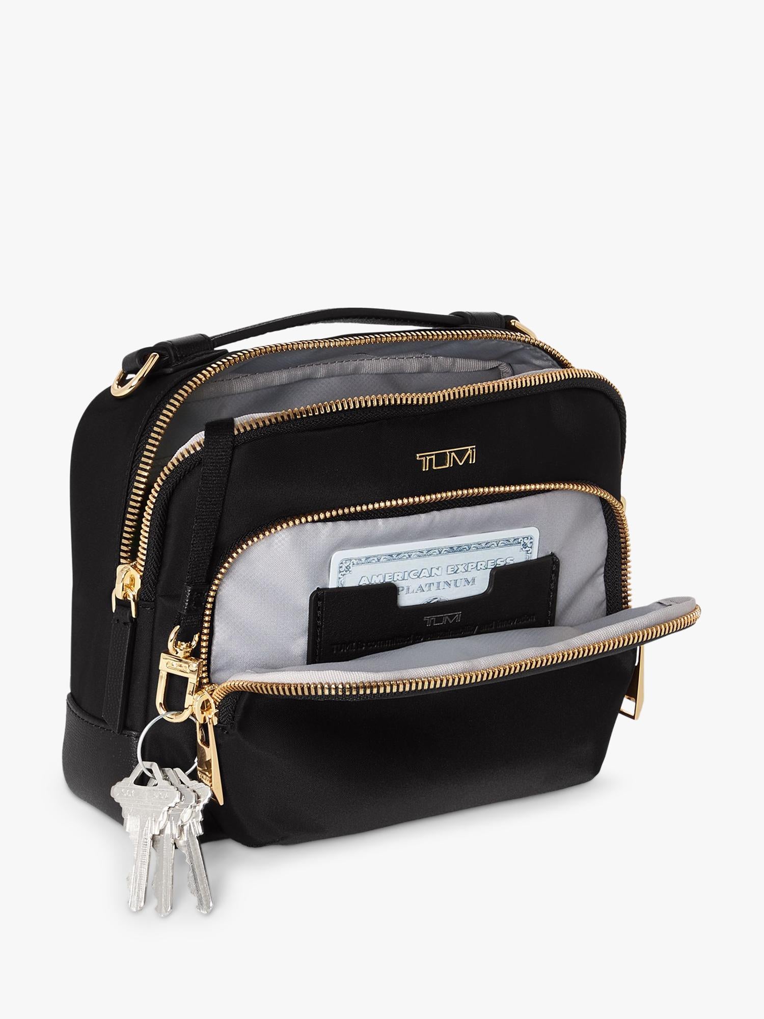 TUMI Teghan crossbody bag black gold, UK version