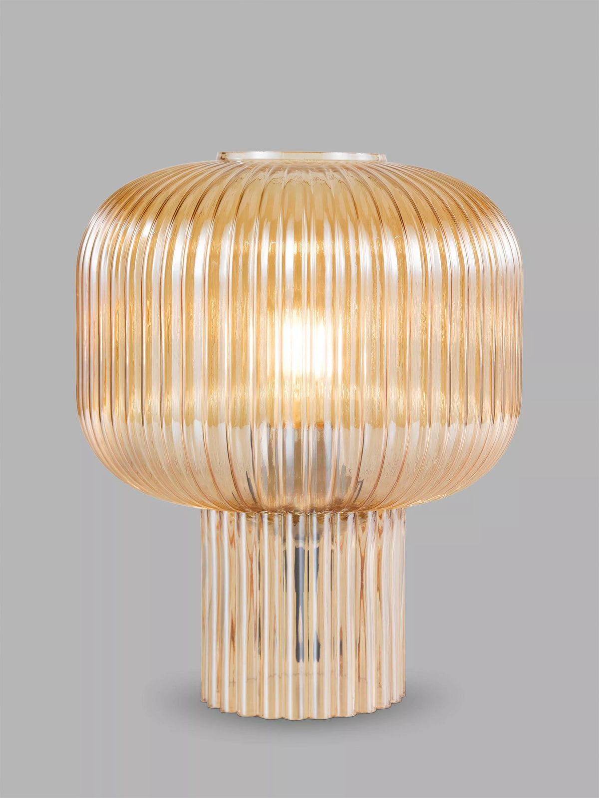 Där Demarius ribbed glass table lamp amber medium, imported from the UK
