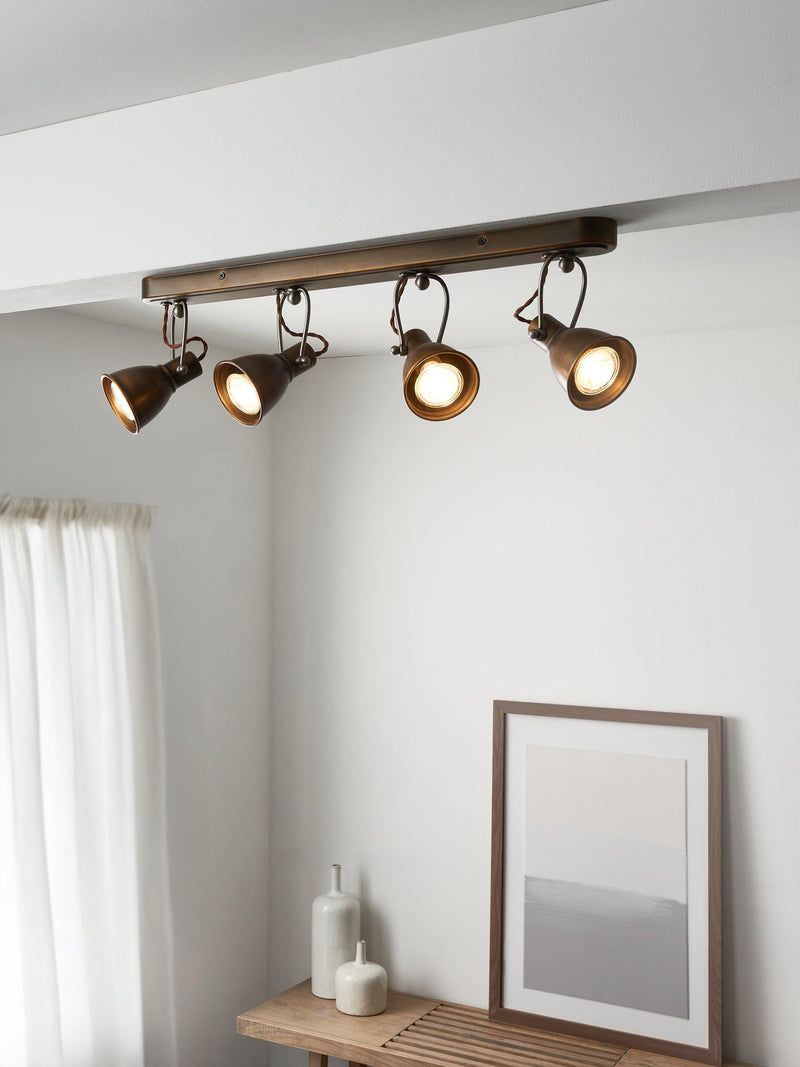 John Lewis Stirrup 4-spotlight ceiling bar warm brass, UK version