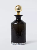 John Lewis black glass decanter and tumbler gift set with gold accents, imported from the UK