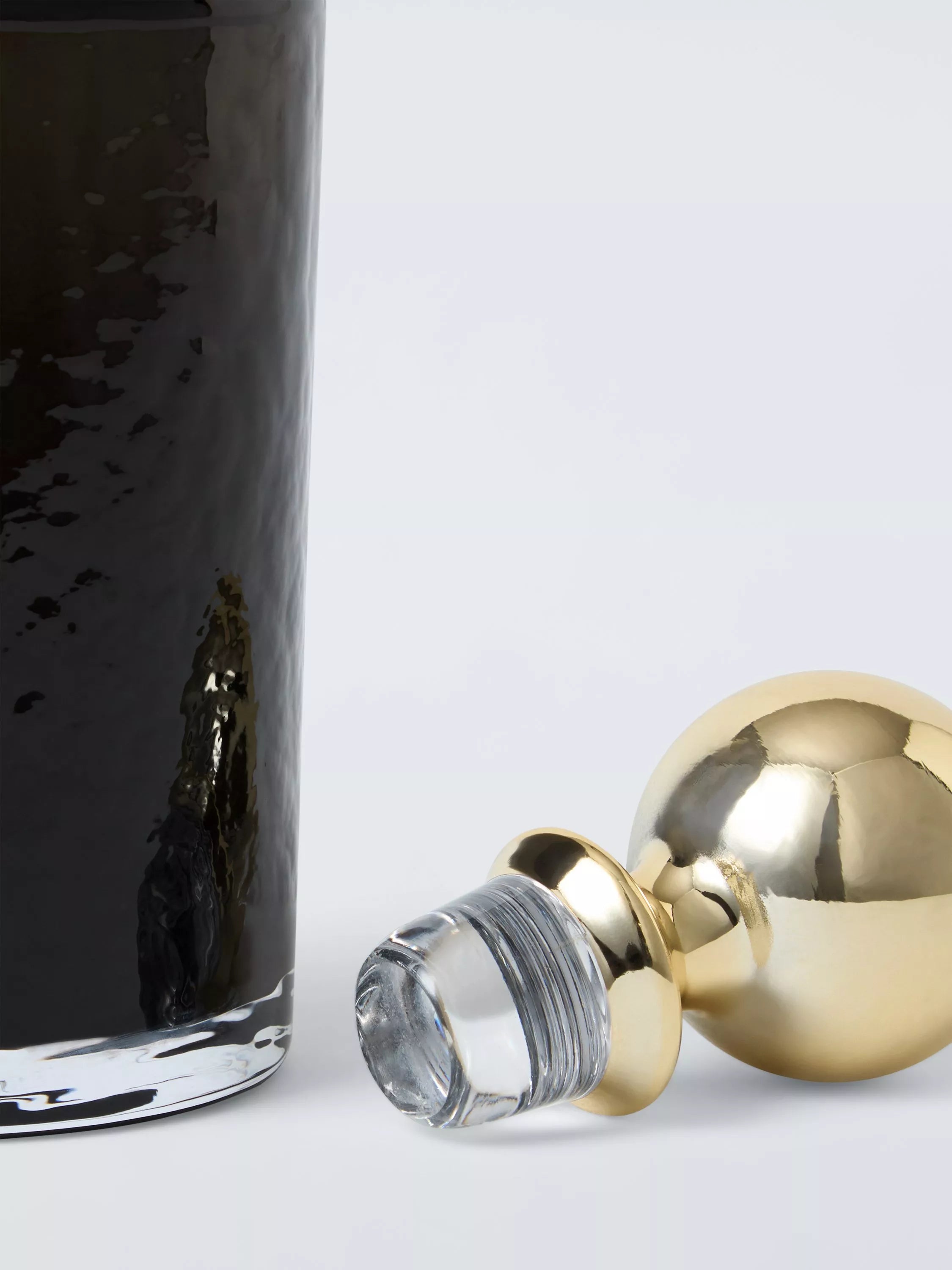 John Lewis black glass decanter and tumbler gift set with gold accents, imported from the UK