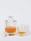 John Lewis ribbed cut glass decanter and tumblers, imported from the UK