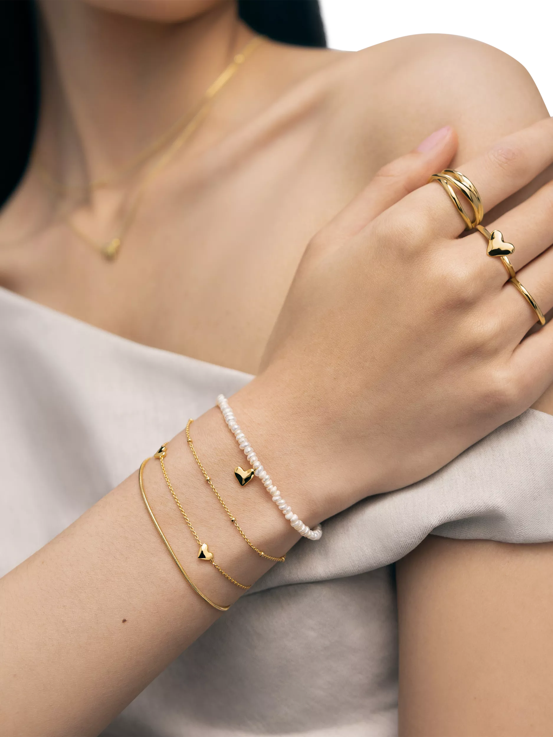 Monica Vinader Mini Heart Pearl Bracelet Gold, imported from the UK