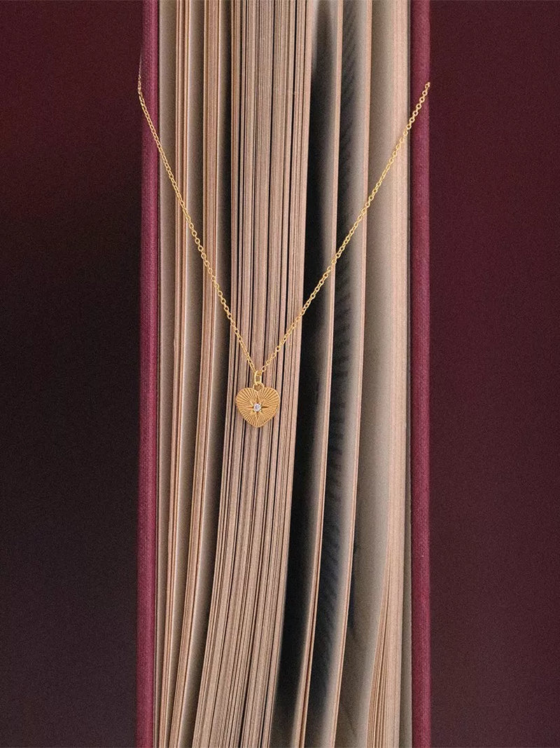 Astley Clarke gold heart pendant necklace with white sapphire (British brand)