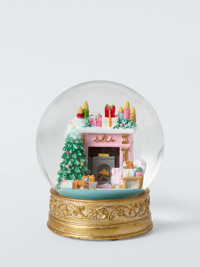 Boule à neige festive cheminée avec flocons de neige