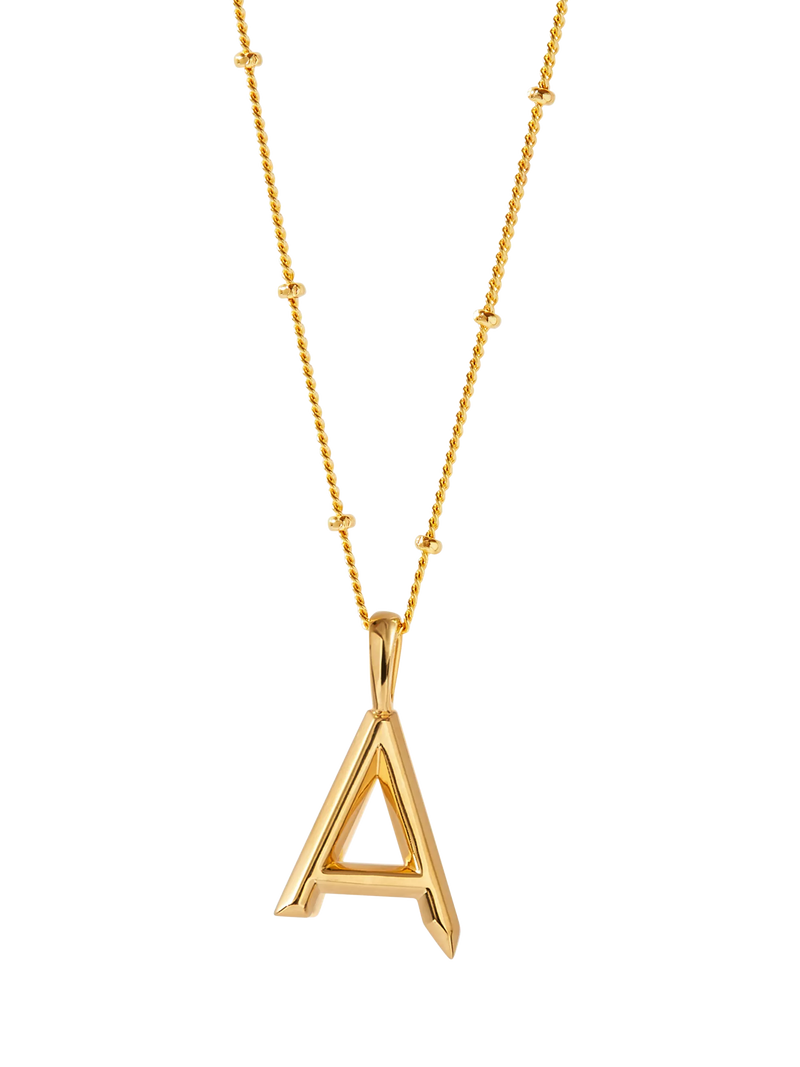 Edge of Ember gold initial pendant necklace (British brand)