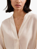 Edge of Ember gold initial pendant necklace (British brand)