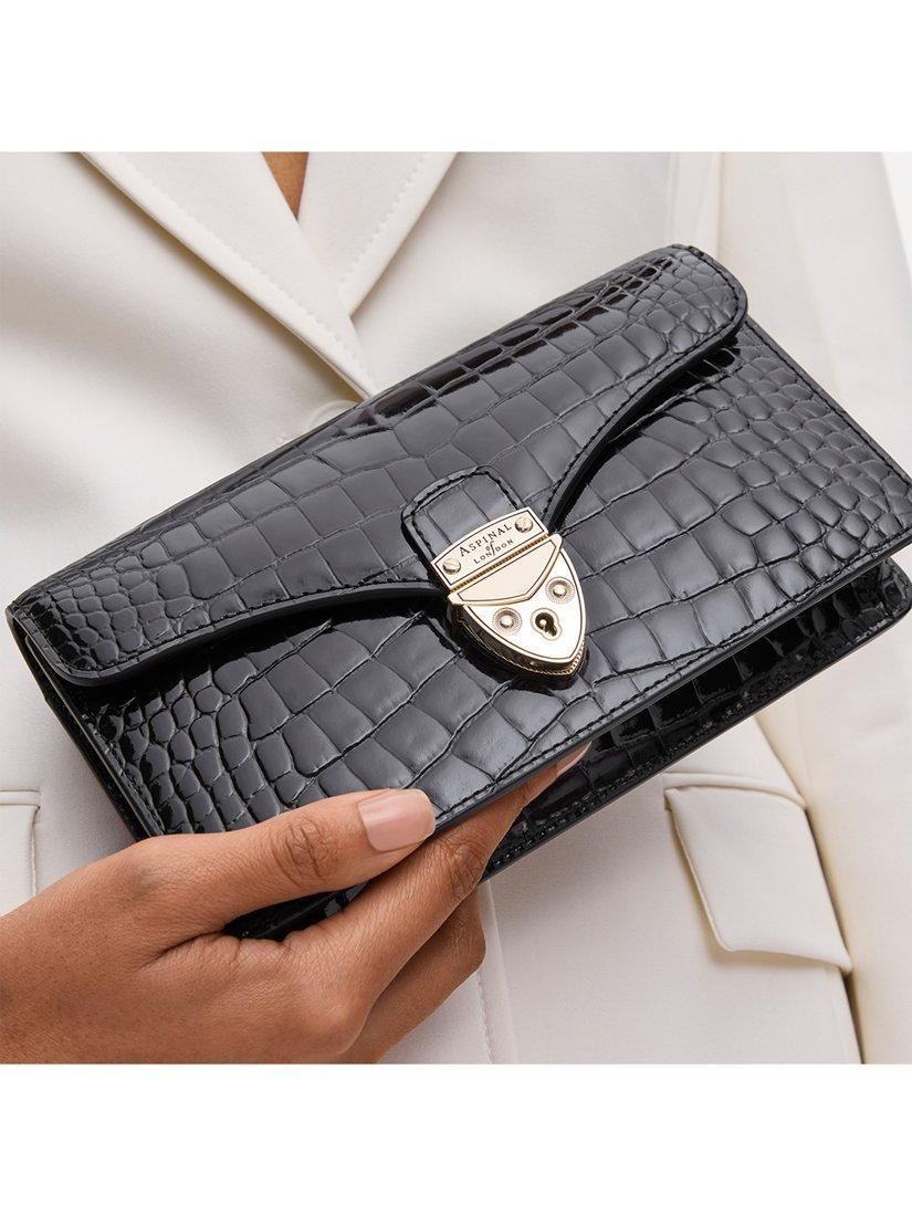 Aspinal of London patent croc clutch bag in black, imported from the UK