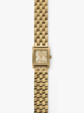 Michael Kors Georgie gold-tone square watch with bracelet strap, imported from the UK