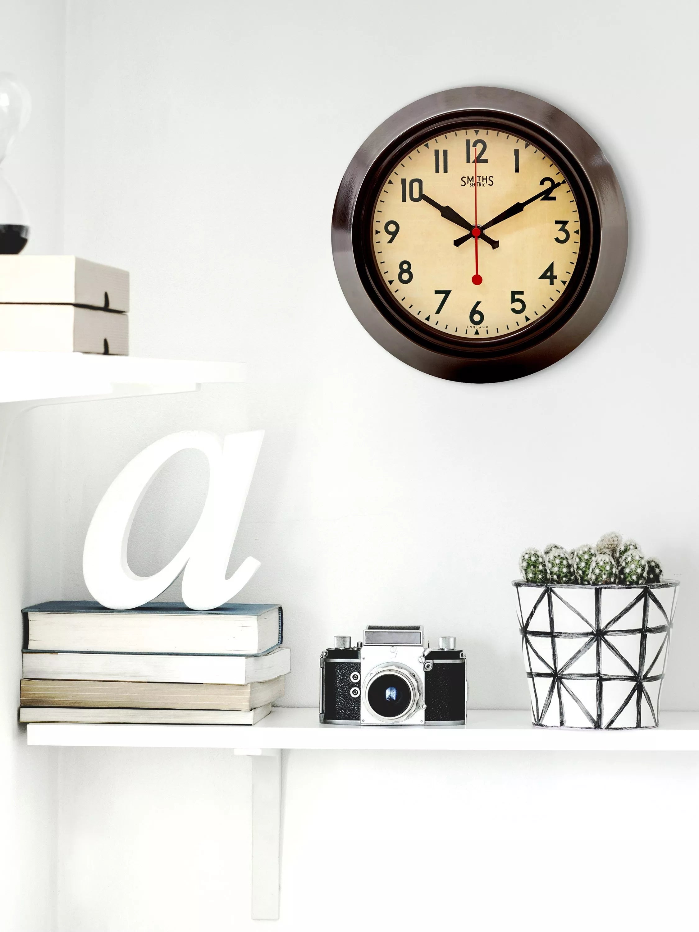 Lascelles brown metal wall clock 25cm, imported from the UK