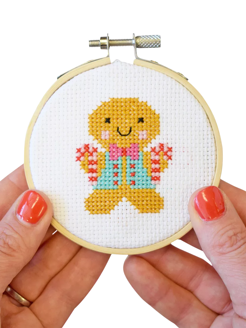 The Make Arcade gingerbread man mini cross stitch kit, UK version