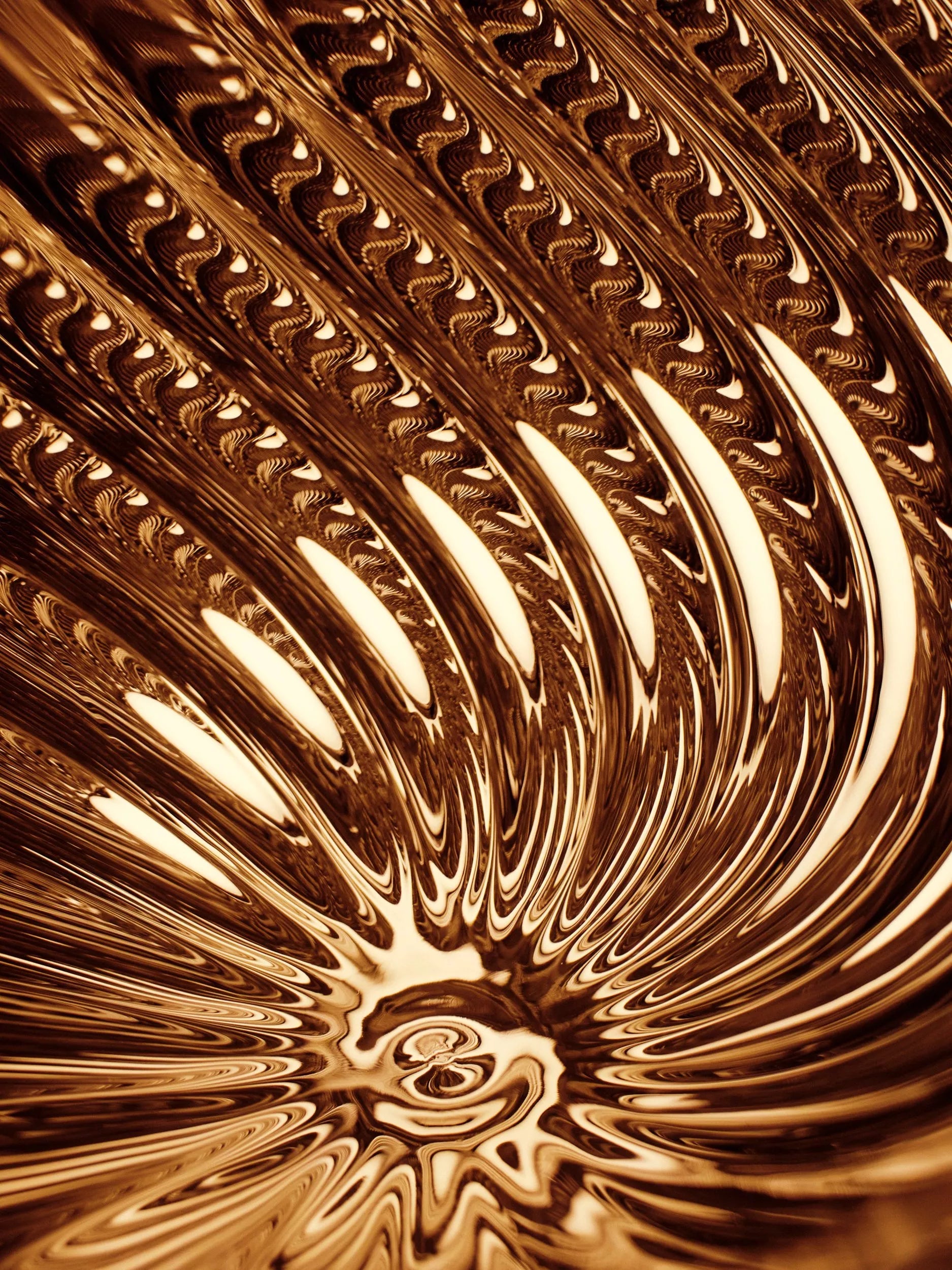 Tom Dixon Whirl large glass pendant ceiling light in gold, imported from the UK
