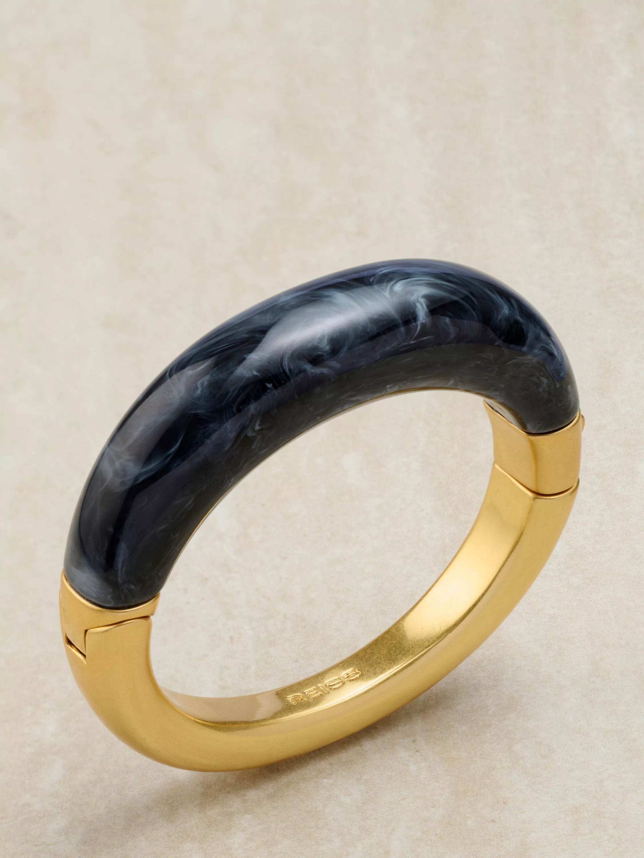 Reiss Salma hinged bangle gold tone and faux marble, imported from the UK
