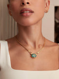 Ottoman Hands Daphne Emerald necklace in gold (British brand)