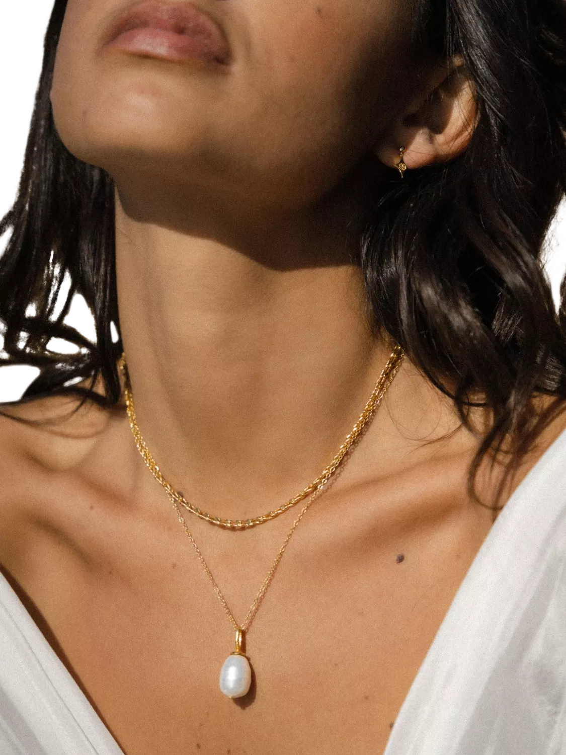 Ottoman Hands Thea snake chain necklace in gold, imported from the UK