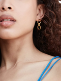 Ottoman Hands drop earrings with double chain in gold (British brand)