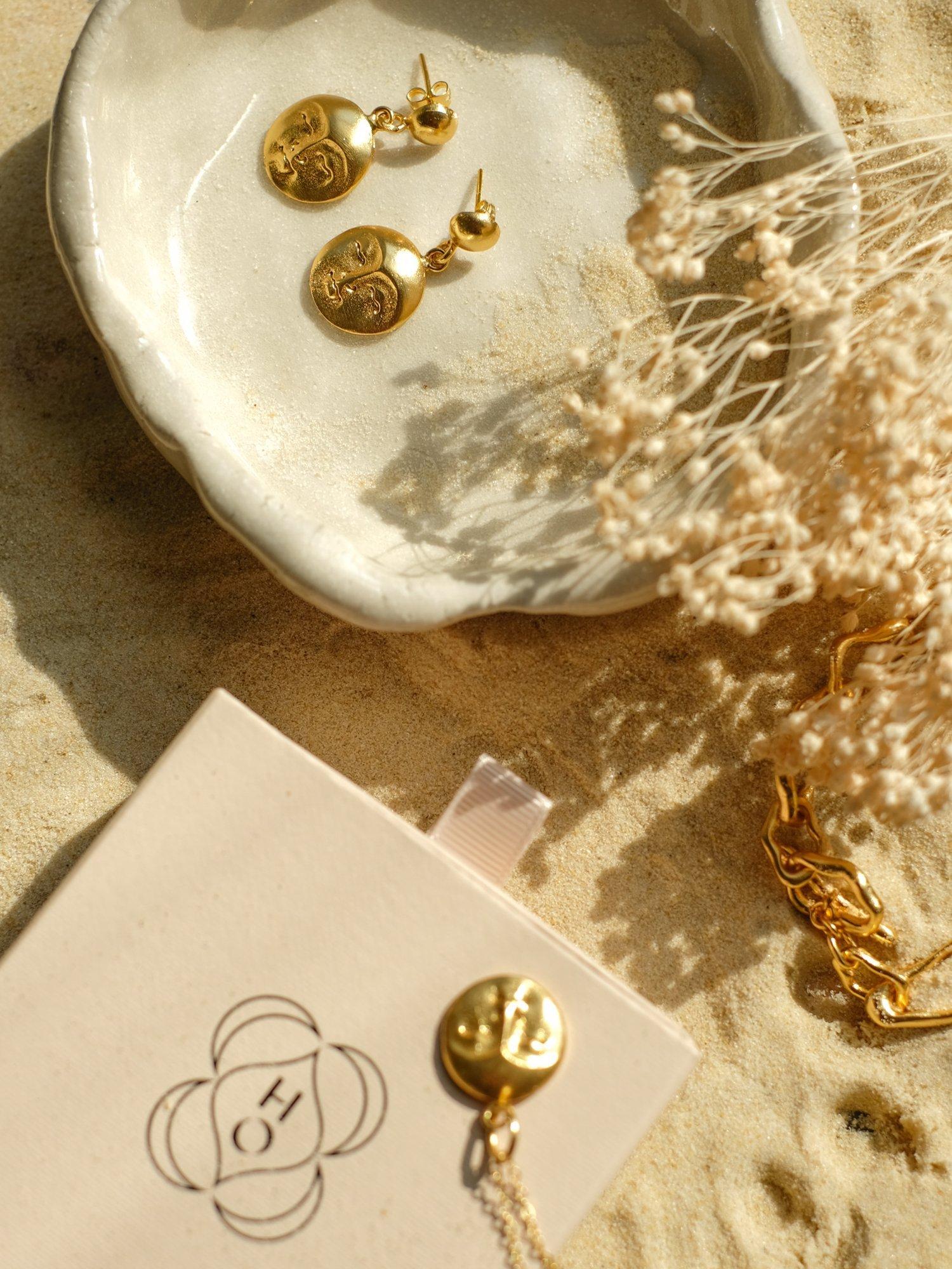 Ottoman Hands moon face gold drop earrings, imported from the UK