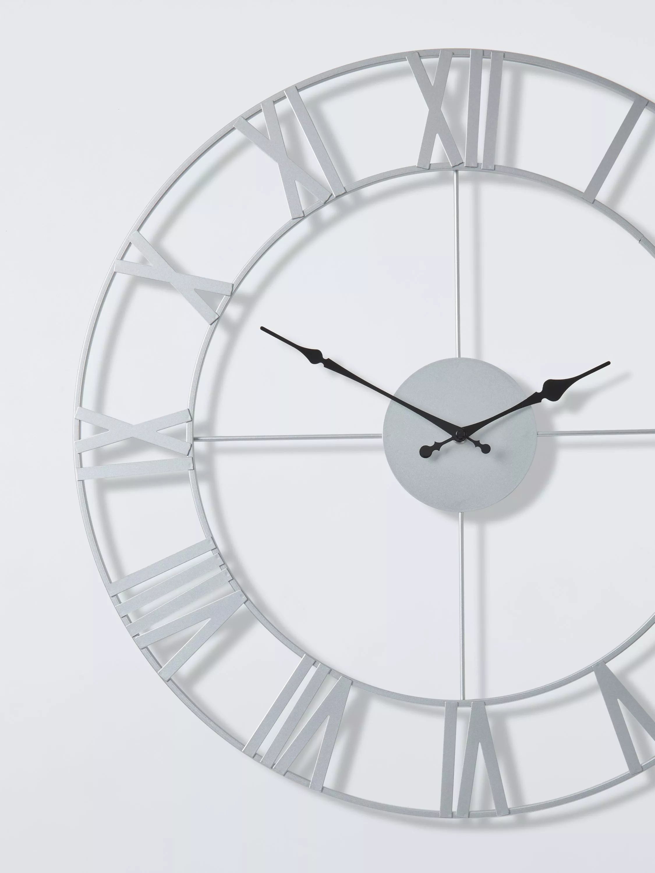 John Lewis 60cm skeleton wall clock Roman numerals (British brand)